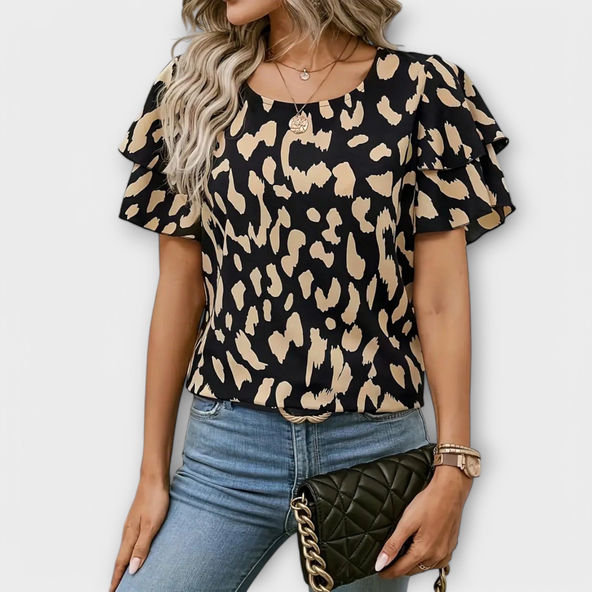 Lela - Elegant blouse with leopard sleeves